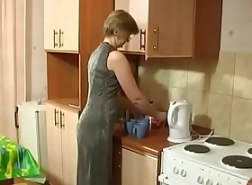 Young boy takes tea with mature - motheryes com