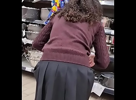 Spying teen girl at customer base - short skirt