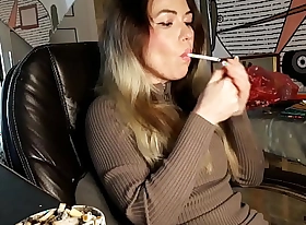 self-effacing wife smokes a cigarette
